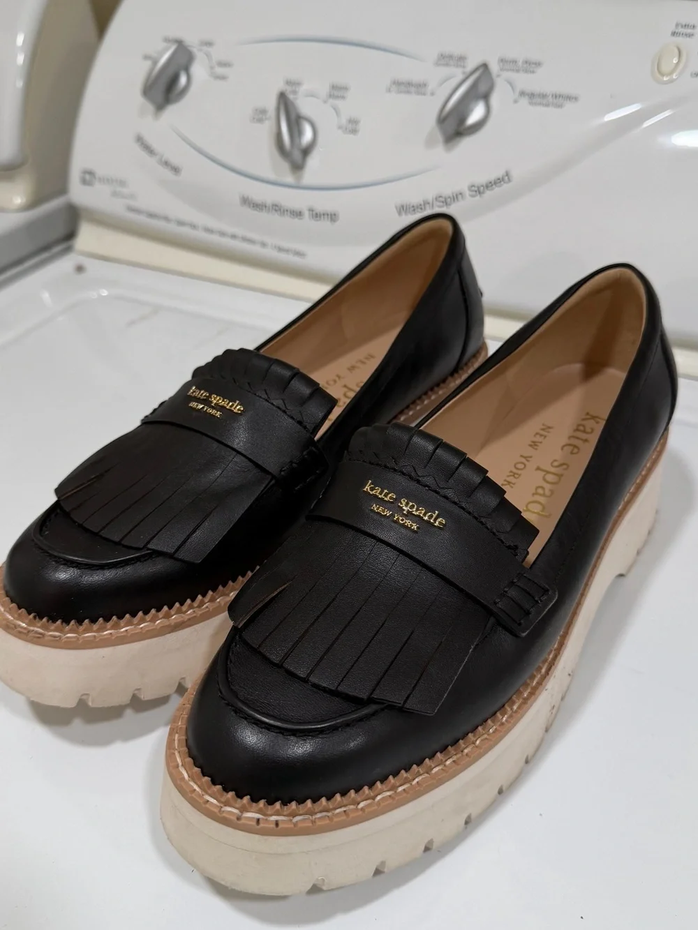 kate spade Black Leather Kiltie Platform Loafers with Cream Sole